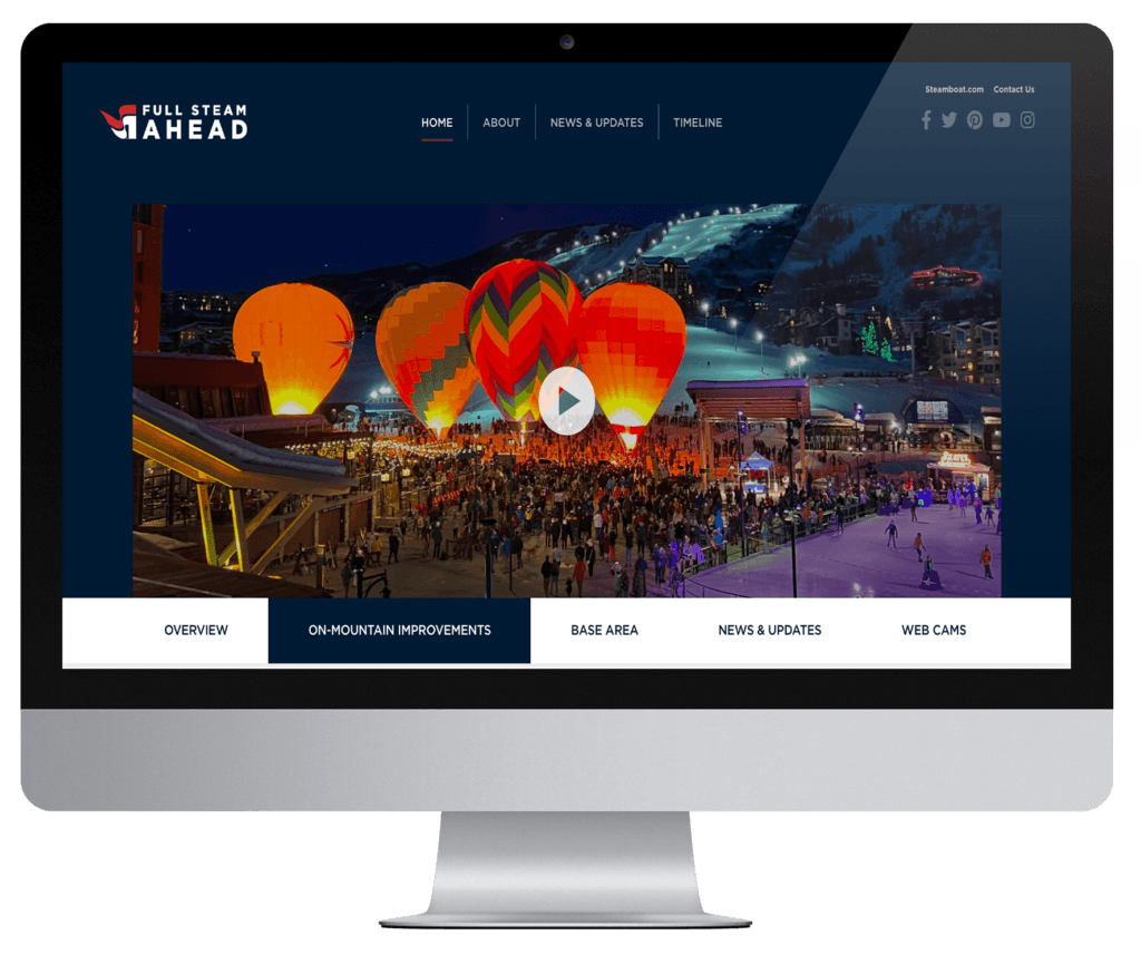iMac mockup of Steamboat resort website showing hot air balloon night event photo