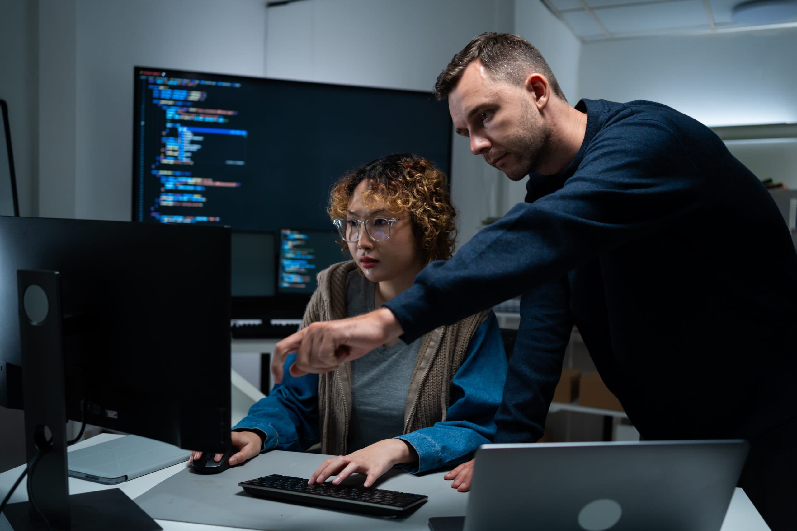 developers collaborating on same computer screen